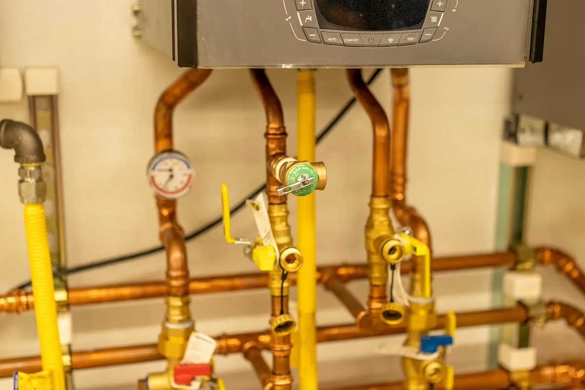 Licensed technician providing Backflow Prevention for a homeowner in Newton